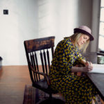 Woman writing at desk