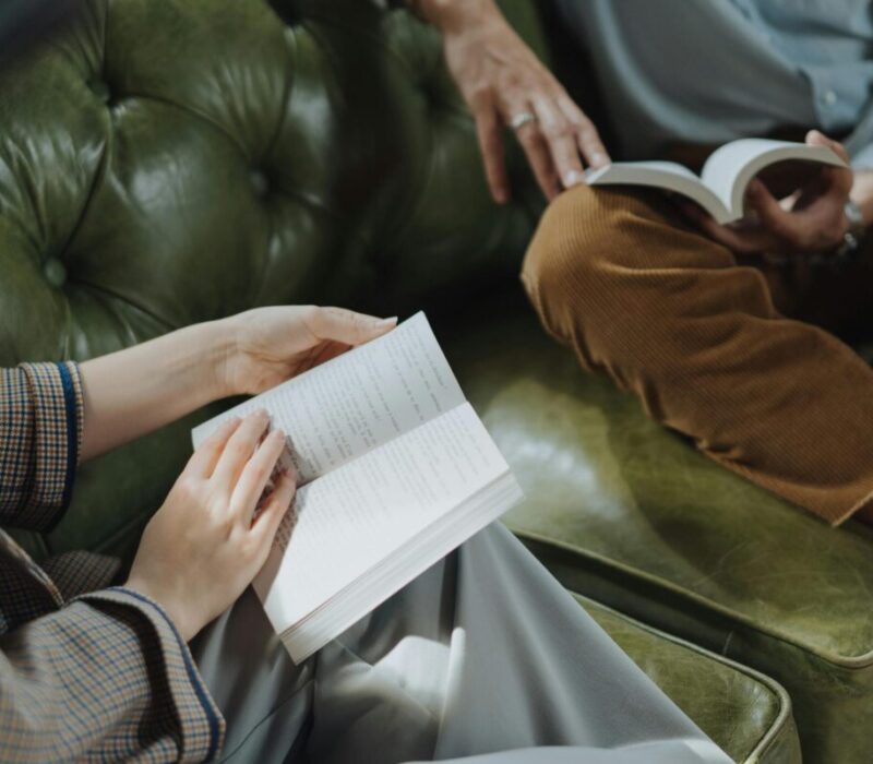 two people reading poetry